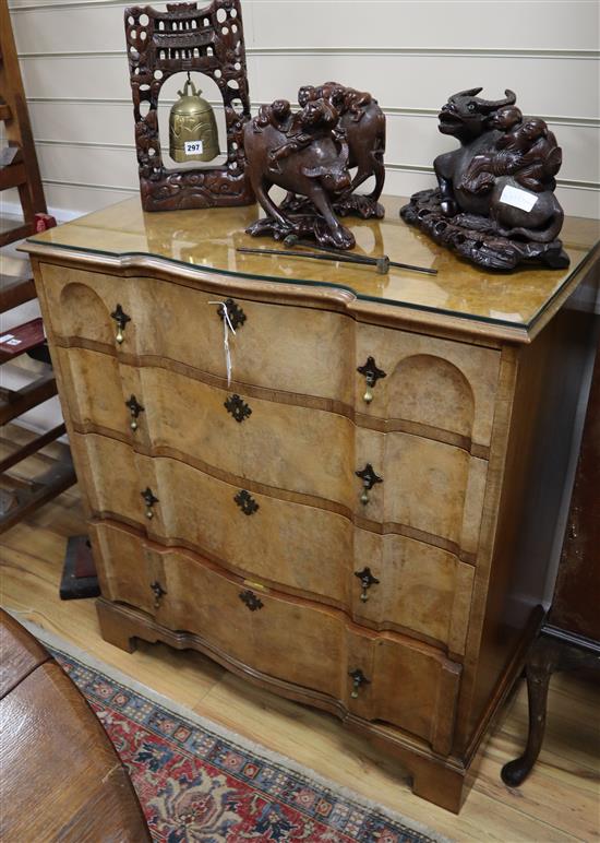 A George I style burr walnut shaped front chest, fitted four long drawers W.92cm